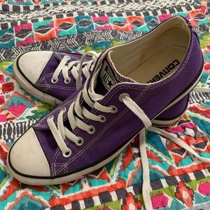 .Purple low top converse all star shoes!